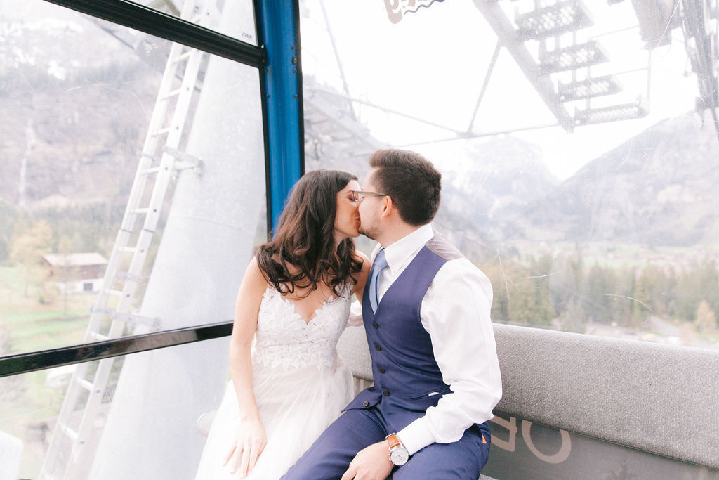 Wedding couple travelling cable car