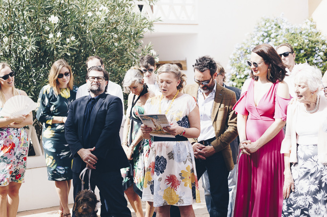 Wedding guests gathered at wedding ceremony