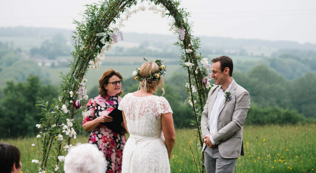 Wedding celebrant leading ceremony in Devon